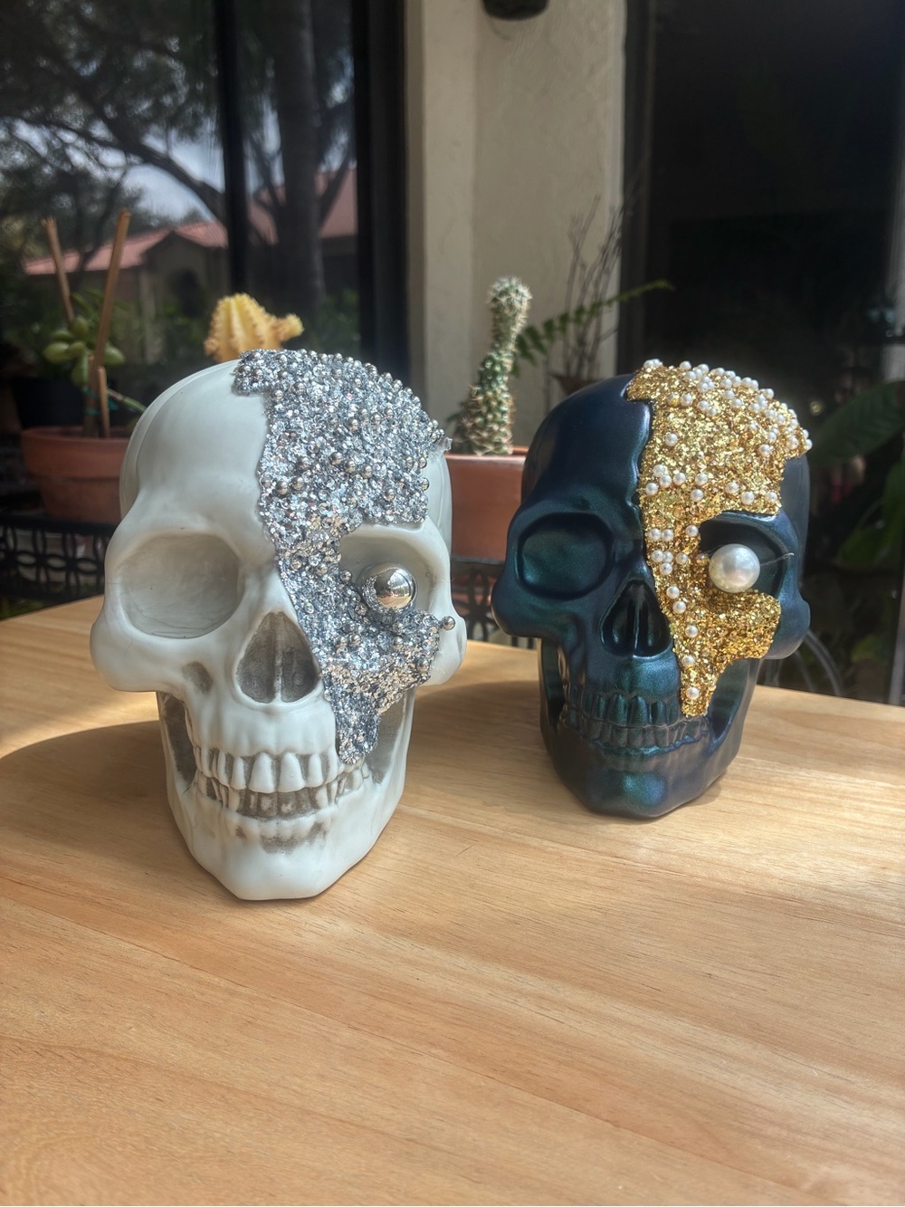 Set of 2 Jeweled Skull Accent Sculptures in White with Silver and Teal with Gold